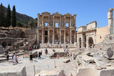 Tourists destination the library of celsus and the gate of augustus in ephesus