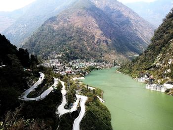 High angle view of road by mountains