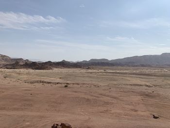 Scenic view of desert against sky