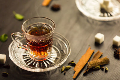 High angle view of tea in glass on table