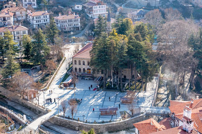 High angle view of street and buildings in city