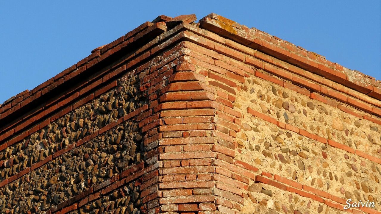 Low angle view of old building against sky