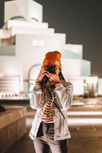 Man photographing with camera