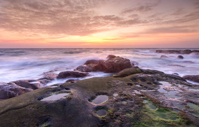 Scenic view of sea against sky during sunset