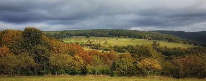 Scenic view of land against sky