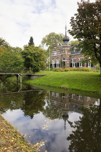 Reflection of building and trees in lake