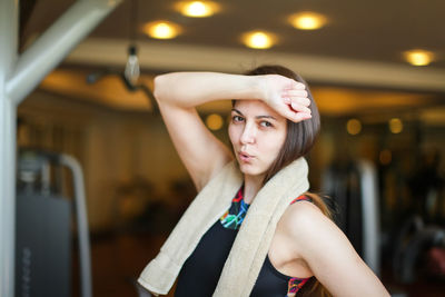 Portrait of woman standing in gym