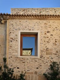 Low angle view of old building against sky