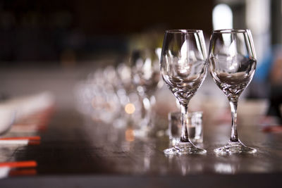 Close-up of wine glass arranged on table in restaurant