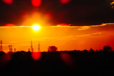 Silhouette of tree against sky during sunset