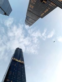 Low angle view of modern buildings against sky