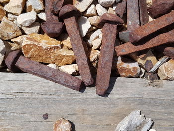 Close-up of rusty chain on rock