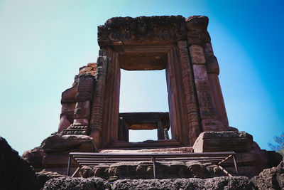 Low angle view of old temple against clear sky