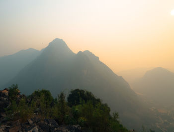 Scenic view of mountains against sky during sunset