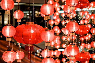 Illuminated lanterns hanging at night