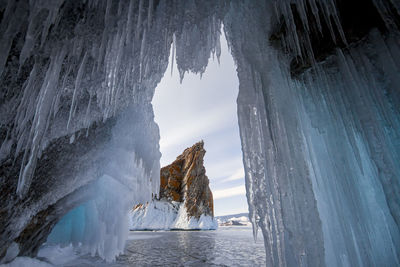 Panoramic view of frozen sea against sky