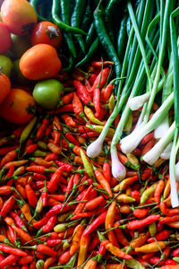 Full frame shot of red chili peppers for sale at market