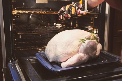 Midsection of man preparing food