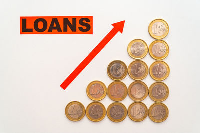 Close-up of coins on white background