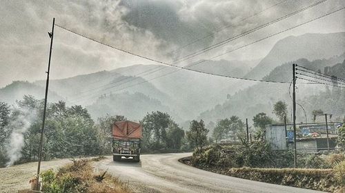 View of landscape against cloudy sky