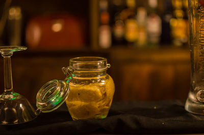 Close-up of drink in glass jar on table