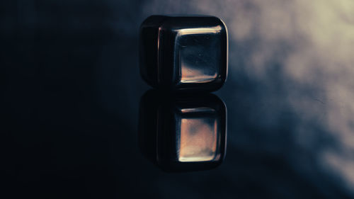 Close-up of camera on table