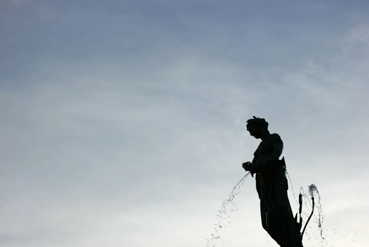 LOW ANGLE VIEW OF STATUE