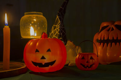 Close-up of illuminated pumpkin against black background