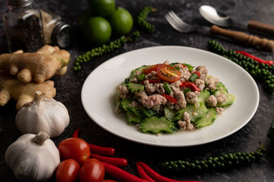 High angle view of vegetables in plate on table