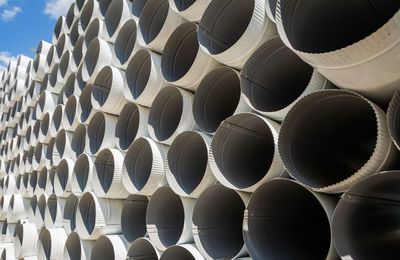 Downpipe warehouse. steel pipes, parts for the construction of a roof drainage system in a warehouse