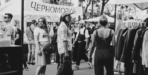 Group of people on street in city