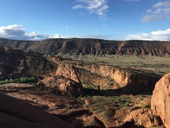 Scenic view of rocky mountains against sky at arches national park