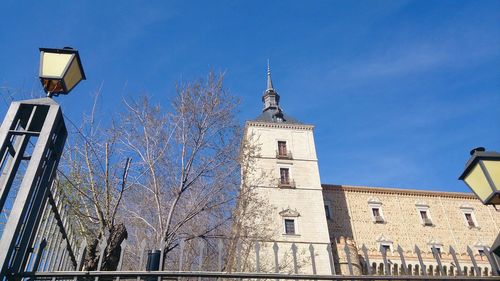 Low angle view of building against blue sky