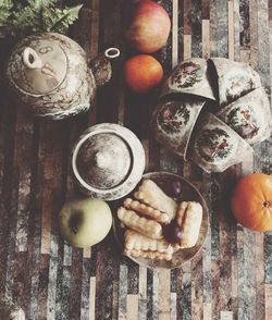 High angle view of apple and fruits on table