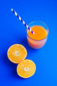 Close-up of drink against blue background