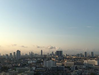 Modern buildings in city against sky