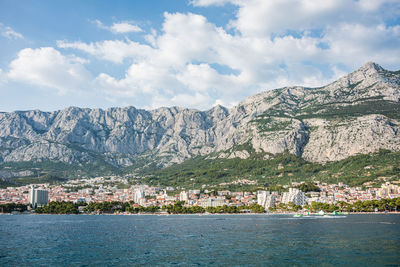 Makarska town situated on the slope of biokovo mountain is the famous resort in croatia, dalmatia