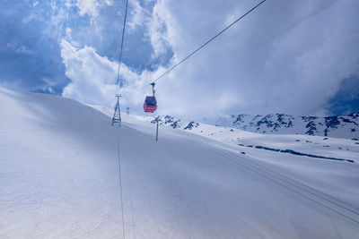 Scenic view of snow covered mountain against sky