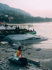 People fishing on beach