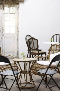 Empty chairs and table in cafe