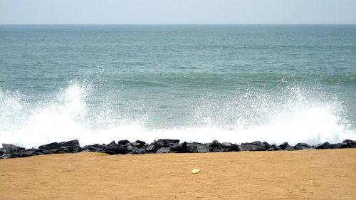 Scenic view of sea against clear sky