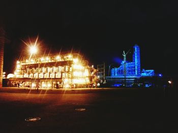 Illuminated street light at night