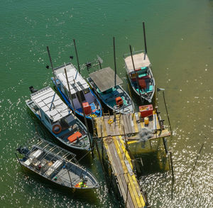 High angle view of boats moored in lake