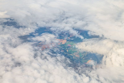 Low angle view of airplane flying in sky