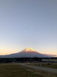 Scenic view of landscape against sky during sunset