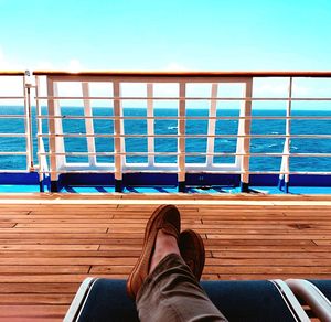 Low section of woman relaxing in boat