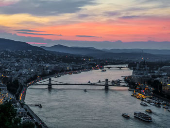 High angle view of bridge over river against sky during sunset