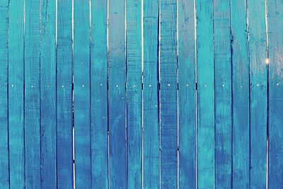 Full frame shot of blue wooden fence