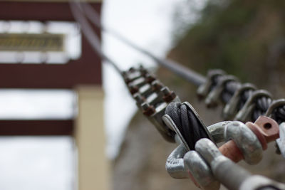 Close-up of rope on metal railing