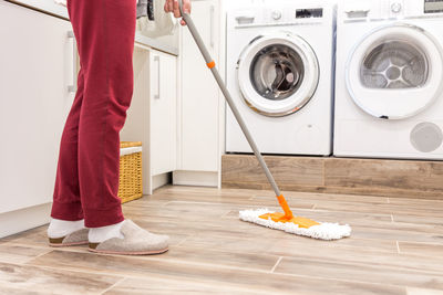 Low section of person standing on floor